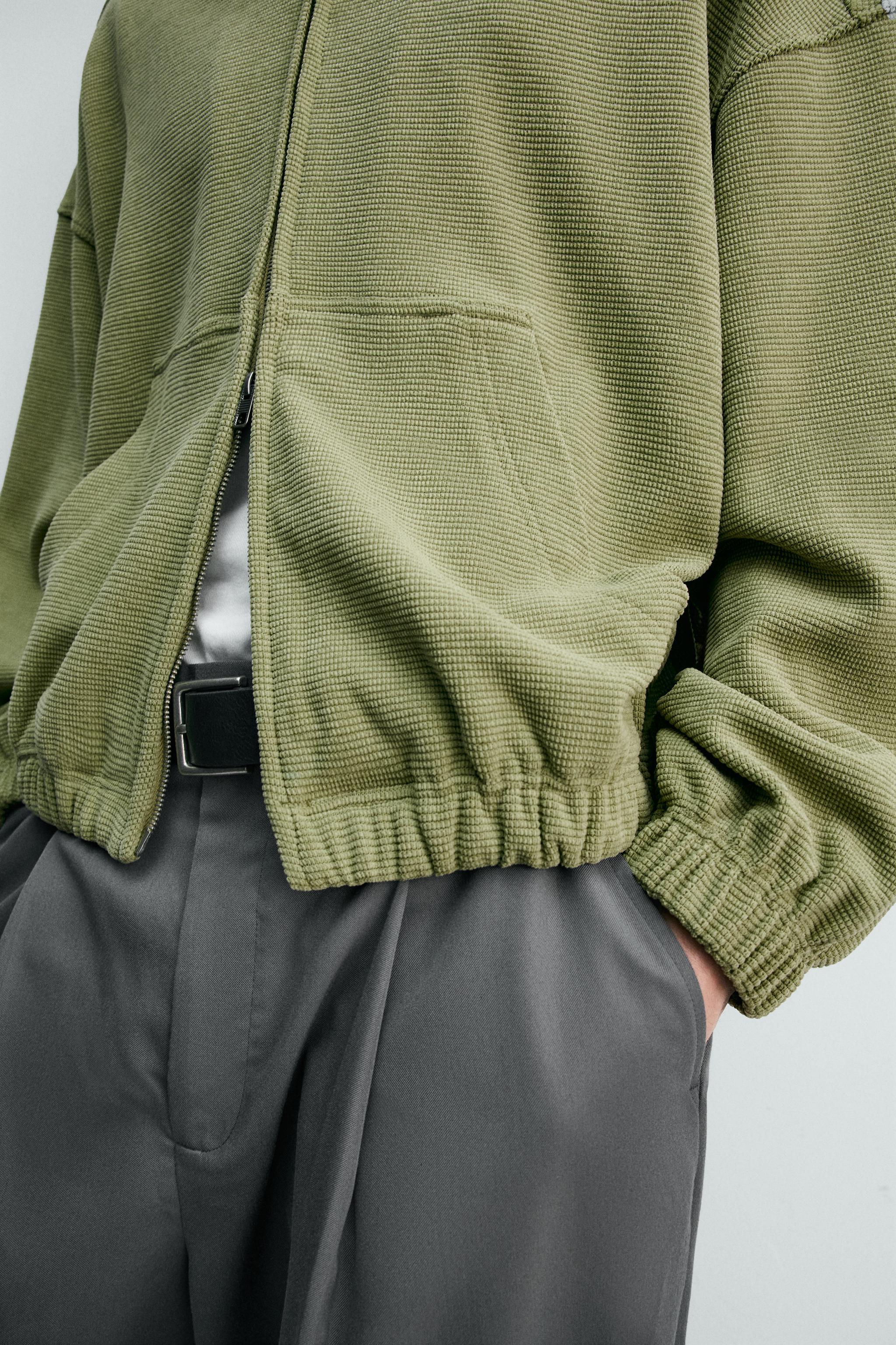 BLOUSON WAFFLE DÉLAVÉ À CAPUCHE